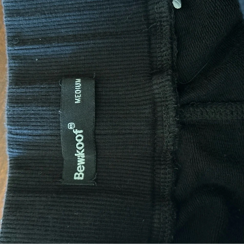 Bewakoof | “Beast” Black Joggers
